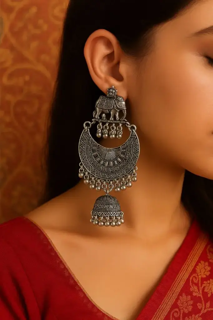 Ragi Ethnic Elephant Charm Silver Jhumka Earrings